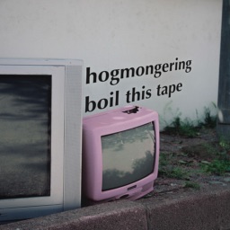 Busted, Pink Television on the side of the road. Text stating band name Hogmongering and demo tape name Boil This Tape